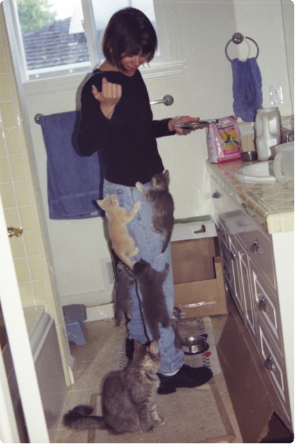 susie_with_kittens.jpg susie_with_kittens.jpg