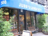 J店