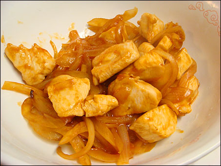 Chicken Breast and Onion Dressed with Ketchup