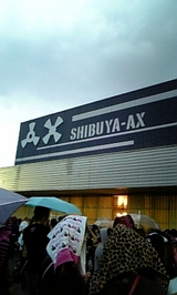 AX��